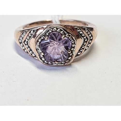 399 - A Silver gilt and Amethyst cluster Ring, size N1/2.