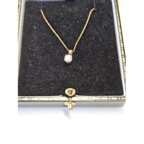 388 - A nice solitaire Diamond Pendant set in 9ct Gold with a Gold chain Diamond approx .4ct.