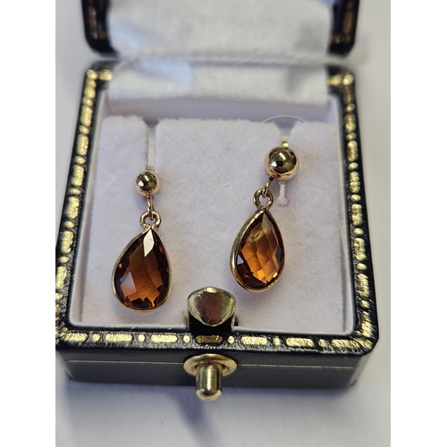 383 - A pair of 9ct Gold and Citrine Earrings.