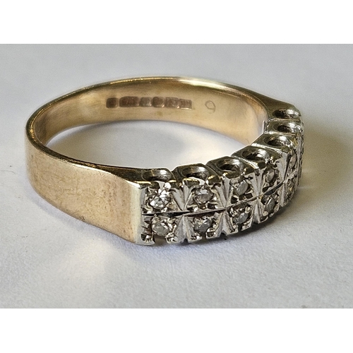 425 - A 9ct Gold and Diamond Ring, consisting of 14 Diamonds set in White Gold, size M.