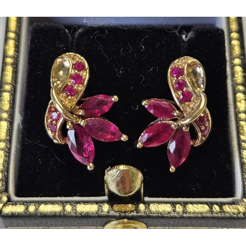 421 - A pair of Gold and Ruby cluster Earrings.