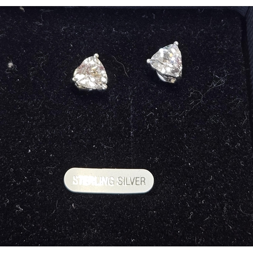 411 - A pair of Silver and CZ Earrings.