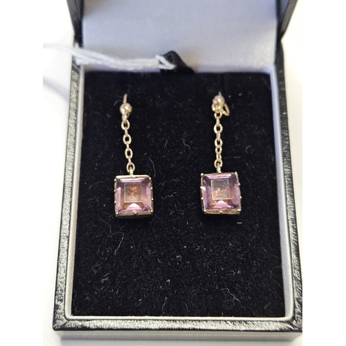 402 - A pair of Victorian Gold and Amethyst drop Earrings.