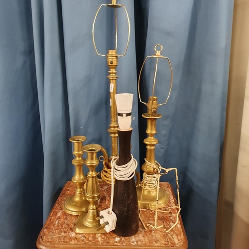 452 - A good quantity of 19th Century and later Candlesticks and Table Lamps.