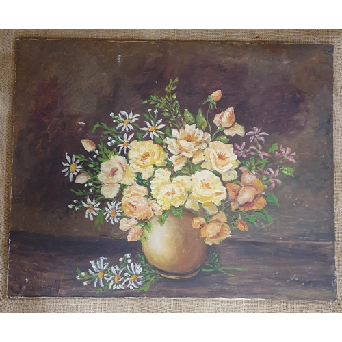 485 - A 20th Century Oil on Canvas still life of roses in a vase. No apparent signature. 65 x 81 cm approx... 