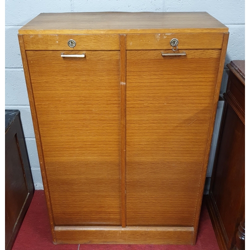 468 - A 20th Century Oak and veneered double fronted Filing Cabinet with fall down tambour doors.
 80 x 35... 