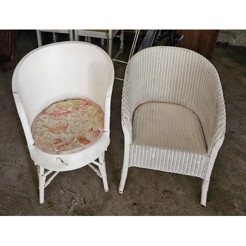 1399A - Two vintage wicker arm Chairs.