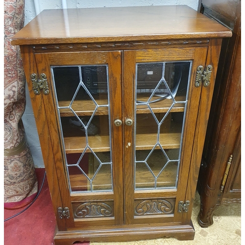 21 - An Old Charm Cabinet with leaded glass panelled front. W 63 x D49 x H 94 cm approx.