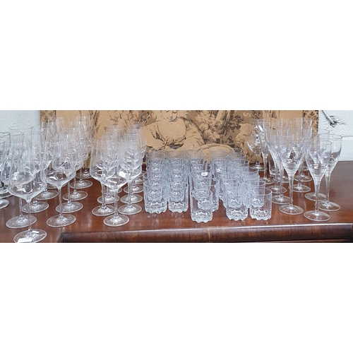 32 - An extremely large quantity of Glassware to include red and white wine glasses.