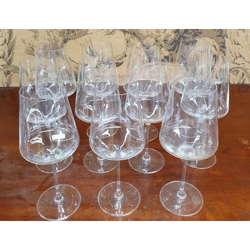 32 - An extremely large quantity of Glassware to include red and white wine glasses.