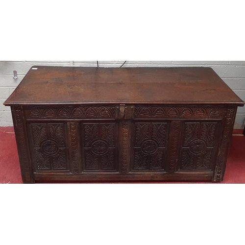 4 - A 19th Century Elm Blanket Chest with highly carved front. W140 x D57 x H63 cm approx.