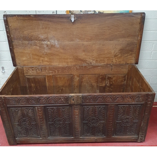 4 - A 19th Century Elm Blanket Chest with highly carved front. W140 x D57 x H63 cm approx.