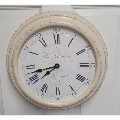 52 - A 20th Century Painted Wall Clock by Theo Applewhite London, with Quartz movement. H37 x D 37 cm app... 