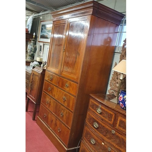 106 - An Edwardian and Mahogany Inlaid Gentleman's Wardrobe with twin door top above a bank of graduated d... 