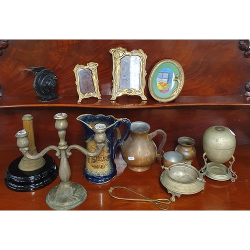 120 - A good quantity of Brassware to include the base of an oil lamp, two art nouveau picture frames etc.