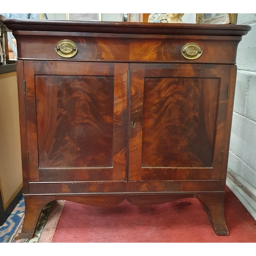 161 - An early 19th Century Mahogany two door Cabinet with single frieze drawer and flame grain panel door... 