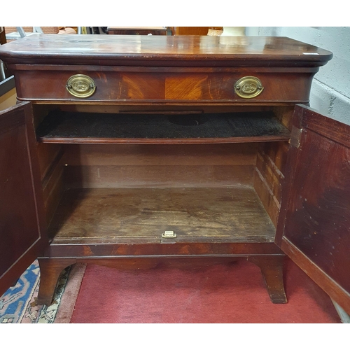 161 - An early 19th Century Mahogany two door Cabinet with single frieze drawer and flame grain panel door... 