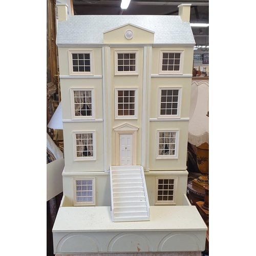 62 - A good Scratch Built Dolls House on table base. 
H 100 x D 64 x W 64 cm approx.