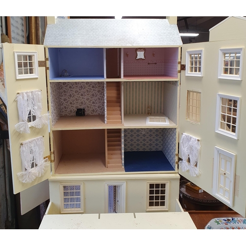 62 - A good Scratch Built Dolls House on table base. 
H 100 x D 64 x W 64 cm approx.