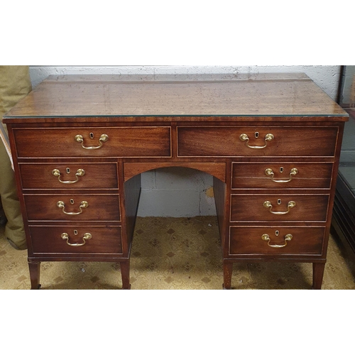 67 - A Georgian Mahogany Side Cabinet with twin frieze drawers over triple drawers with kneehole centre o... 