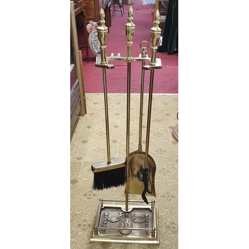 68 - A good 20th Century Brass Companion Set. H 77 cm approx.