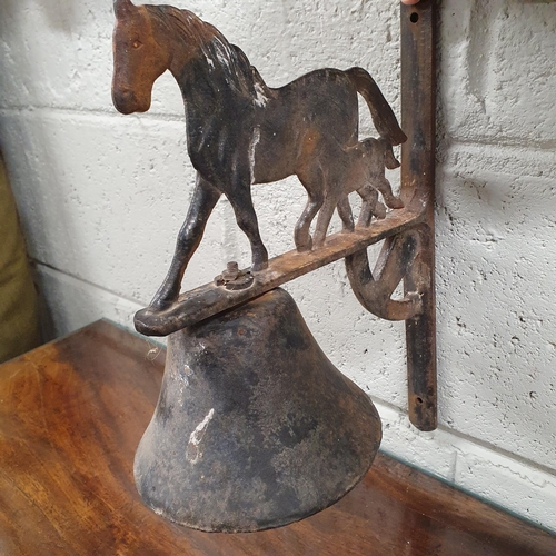 73 - A 20th Century Wall Mounted Bell depicting Horse and Foal. H 34 x W 28 cm approx.