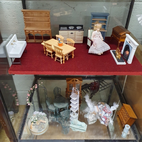 78 - A Large Quantity of Dolls House Furniture on five shelves.