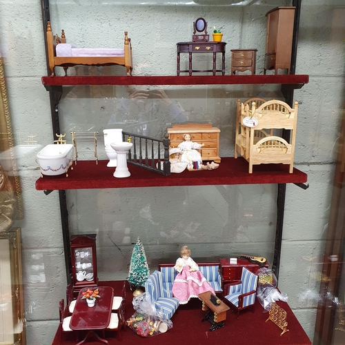 78 - A Large Quantity of Dolls House Furniture on five shelves.