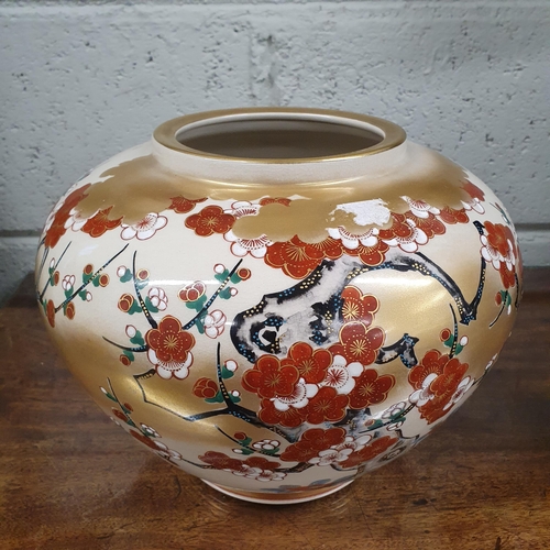 93 - A large Oriental Bullous Vase/Pot with hand painted cherry blossom detail. H 38 x D 25 cm approx.