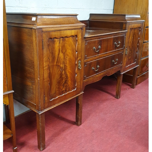 96 - A 19th Century Mahogany Side Board with pedestal style sides and flanking, twin drawer centre and sq... 