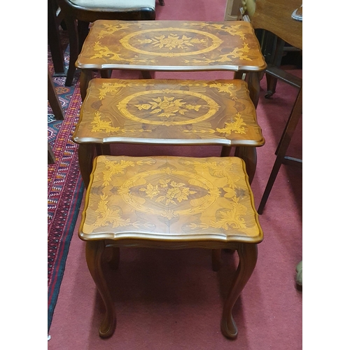 322 - Of lovely quality. A Nest of three Walnut and Veneered reproduction Tables with highly inlaid tops o... 