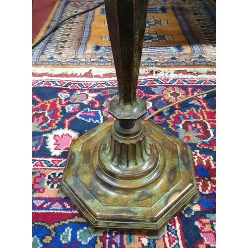 251 - A good Metal Standard Lamp with octagonal base.
H 150 cm approx.