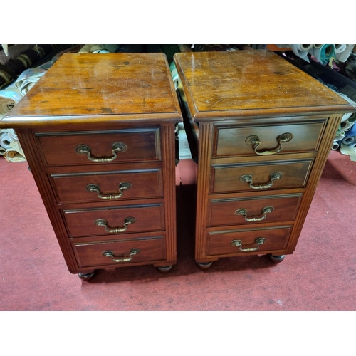 527 - A good pair of Mahogany bedside Cabinets with four graduated drawers with brass swan neck handles. W... 