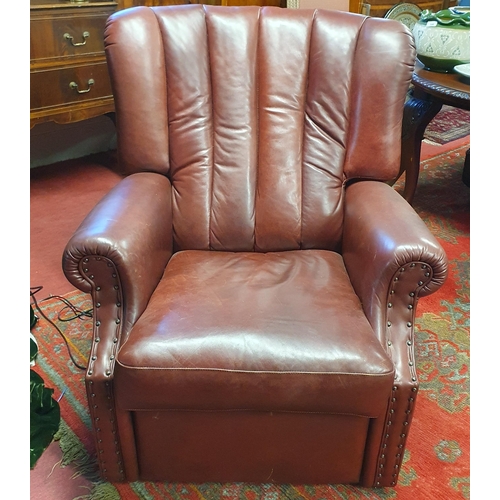 351 - Of very good quality. A Burgundy Leather Armchair with adjustable seat.
BH 97 x W 86 x D 90 cm appro... 