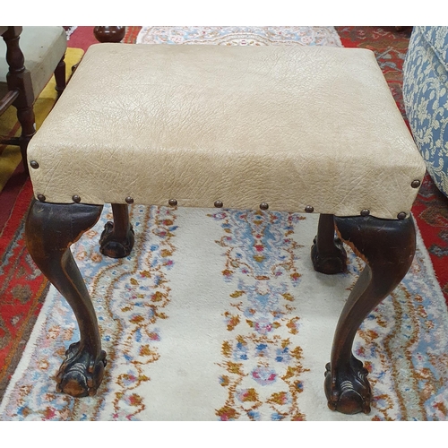 390 - An early 20th Century rectangular Stool with ball and claw supports.
H 48 x W 53 x D 36 cm approx.