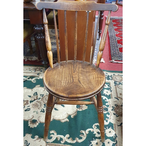 391 - A 19th Century Elm Windsor Chair along with a 20th Century stool. Stool H 77 cm approx.