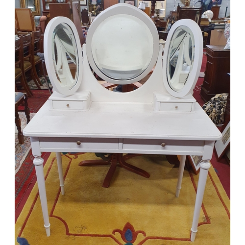 505 - A 20th Century Painted Dressing Table with double frieze drawers and tryptic mirror back on turned s... 