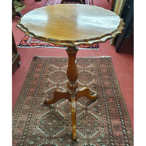 515 - A 19th Century Mahogany scalloped edge wine Table. (slight repair needed to the frieze and leg) 
H 6... 