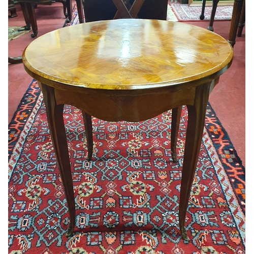 518 - A 20th Century Rosewood and Veneered circular lamp Table.
H 54 x D 50 cm approx.