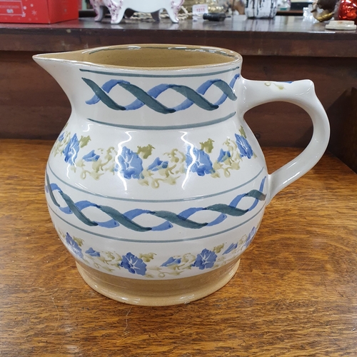 529 - A Nicholas Mosse large Pottery Jug designed by Sybil Connolly for Tiffany & Co. H 19 cm approx.