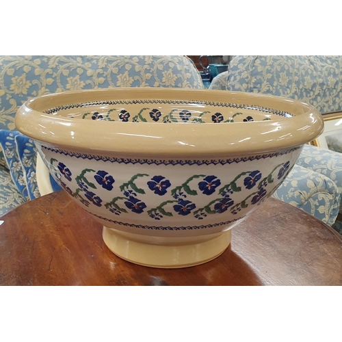 536 - A large Nicholas Mosse Pottery Bowl decorated with violets.
H 18 x D 36 cm approx.