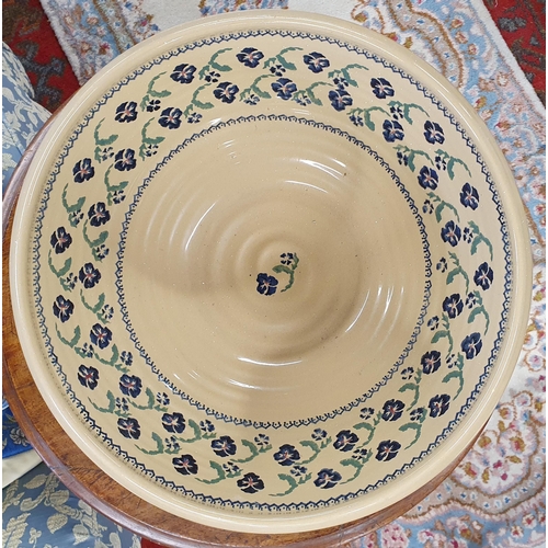 536 - A large Nicholas Mosse Pottery Bowl decorated with violets.
H 18 x D 36 cm approx.