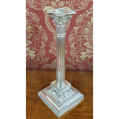 565 - A Superb and elegant set of four 19th Century Silver plated Corinthian Columned Candlesticks, in ver... 