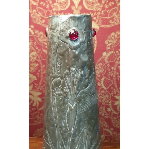 658 - A rare Art Nouveau Pewter Vase in the manner of Archibald Knox with repose decoration of Birds in fl... 