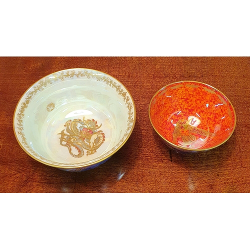 673 - A Wedgewood lustre Dragon Bowl along with a Wedgewood humming bird bowl.
H 6 x D 10 cm approx.