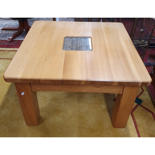 513 - A square Oak Coffee Table on square supports by Bevel Furniture, Wexford.
H 46 x W 76 x D 76 cm appr... 