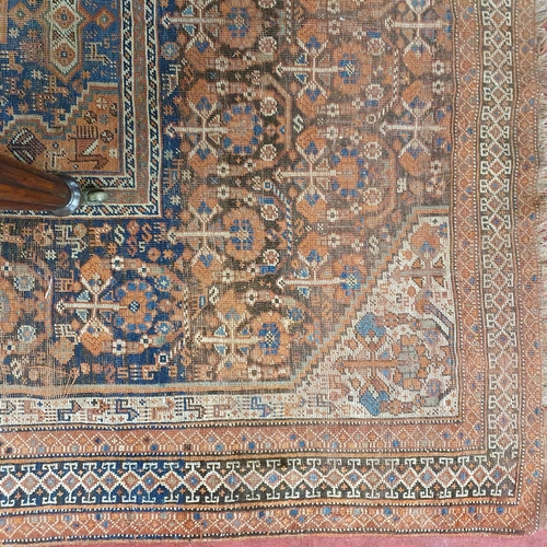 523 - A 19th Century Persian Rug, well worn.
L 204 x W 173 cm approx.