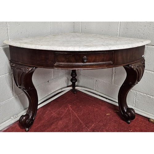 136 - A good unusual 19th Century Mahogany Corner Table with single frieze drawer and carved cabriole supp... 