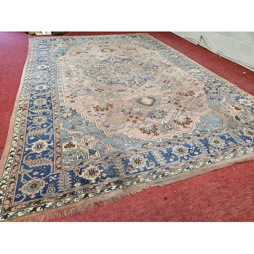 324 - An extremely large Pink ground Carpet with multi borders and unique central medallion design.
370 x ... 