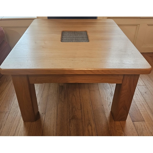 513 - A square Oak Coffee Table on square supports by Bevel Furniture, Wexford.
H 46 x W 76 x D 76 cm appr... 